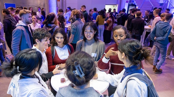 Students at the foyer of the Audimax networking