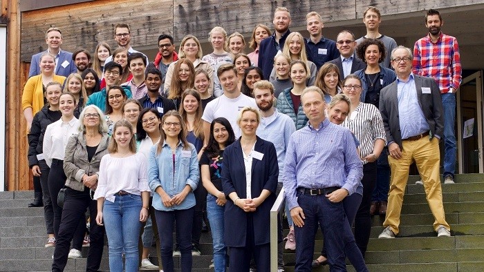 Group shot of the participants of the retreat in front of the Fraunhofer Research Campus in Waischenfeld.