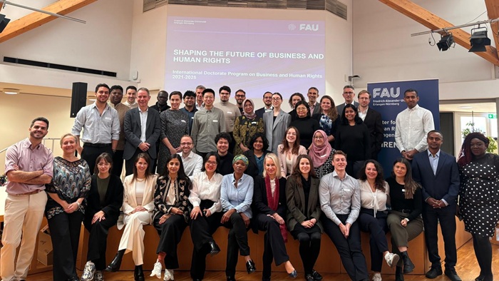 Group of conference participants gathered in the main hall in the CHREN building in Nuremberg.