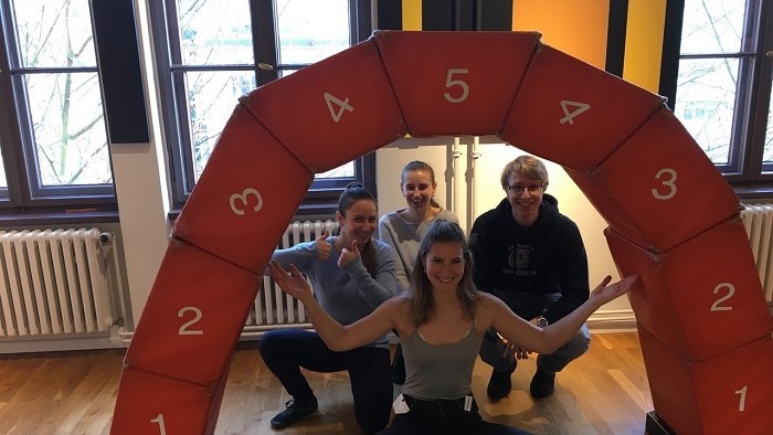 Students present a round arch made by single pieces