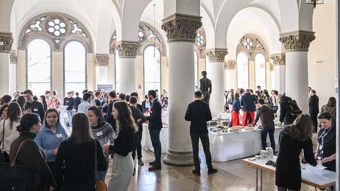 People gathering in a Hall