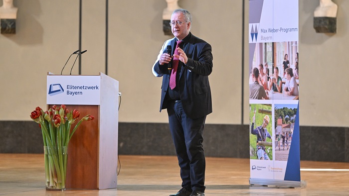 A man is standing on a podium.